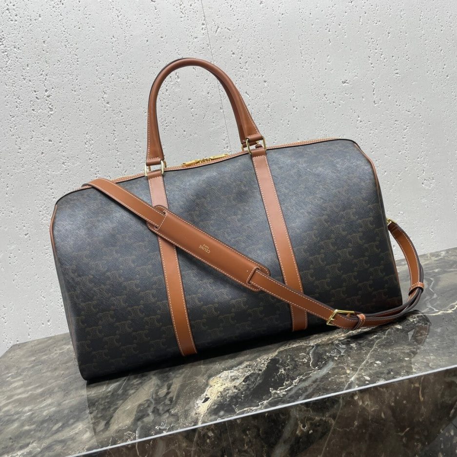 Ce**e medium duffle bag in logo-print calfskin