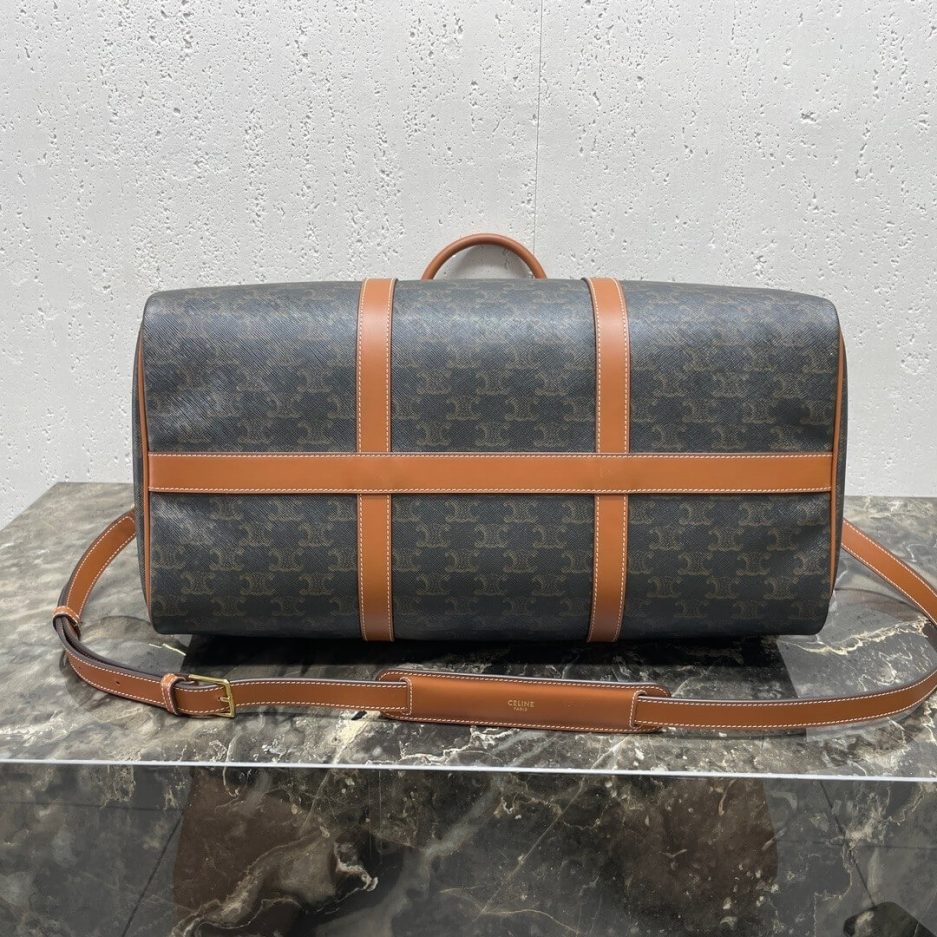 Ce**e medium duffle bag in logo-print calfskin
